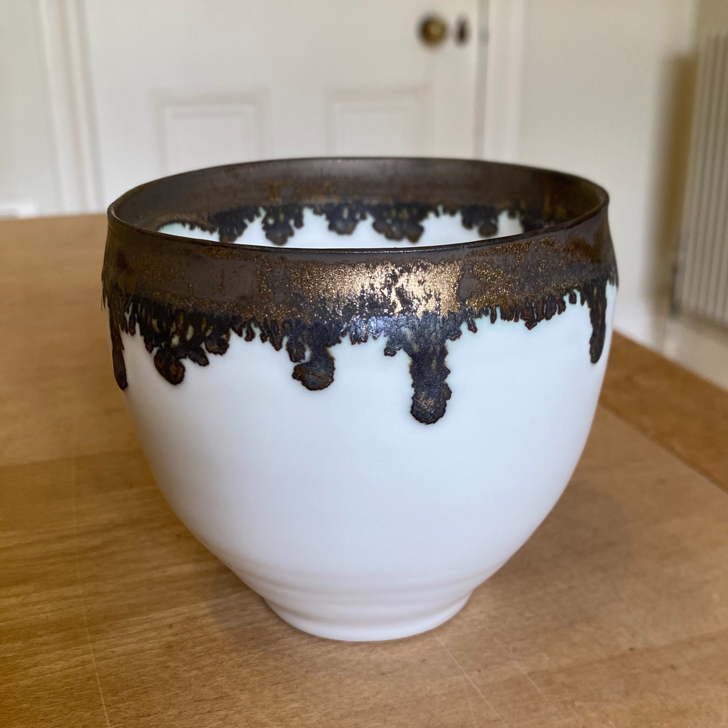 Bronze glaze test, this one’s a bit runny. Fired in an electric kiln to cone 8. Recipe from my book Special Effect Glazes.