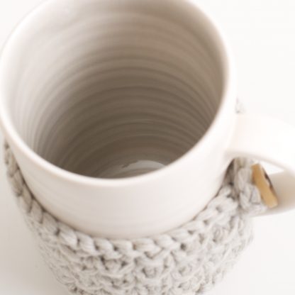 handmade porcelain- mug- tea- grey- knitted cosy- ruth cross- mug cosy