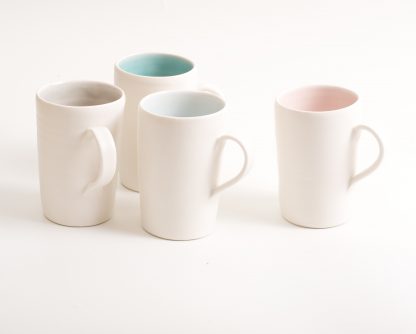 mug-porcelain-handmade-ceramic-tableware-tea-coffee- pink- grey- turquoise- blue- knitted -cosy- tea cos