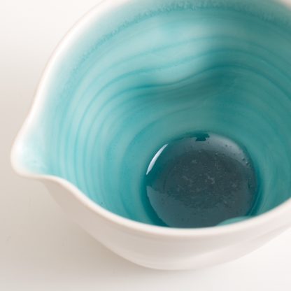 dinnerware- tableware- handmade porcelain- turquoise pourer- pouring bowl- dimpled