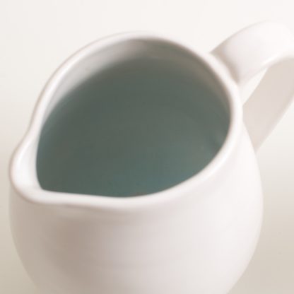 tableware designer- cafe range-blue jug- linda bloomfield- stoneware- coloured interior- made in england