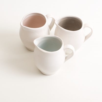 stoneware range- cafe tableware- pink interior- jug- flowers- water jug - designed by linda bloomfield- blue- grey