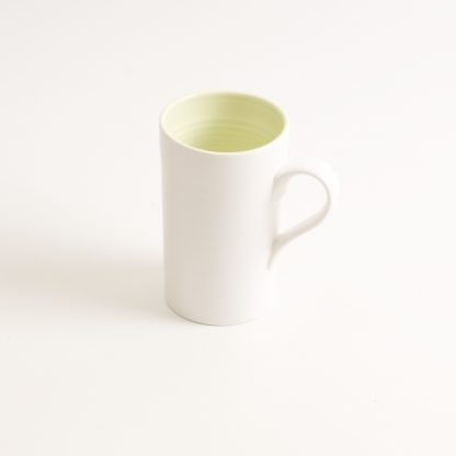 porcelain tableware- made in china- grey mug- linda bloomfield- porcelain designer- tableware designer- ruth cross- knitted cosy- mug cosy