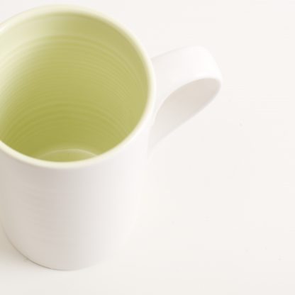 porcelain tableware- made in china- citrine mug- linda bloomfield- porcelain designer- tableware designer- ruth cross- knitted cosy- mug cosy