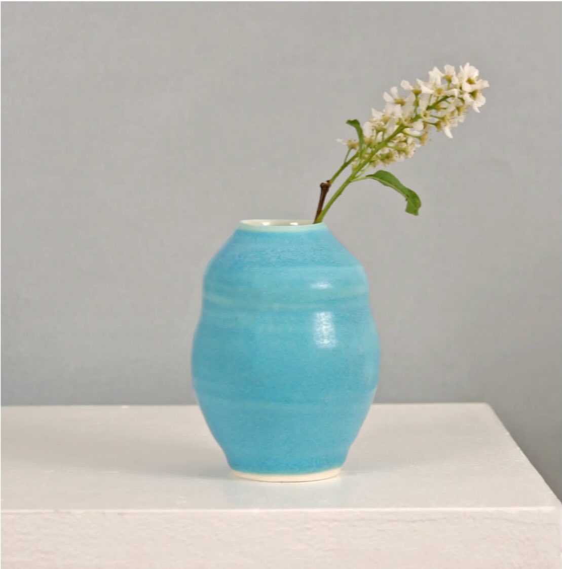 I’m fascinated by glaze recipes and interested to find out where they originated. I have been researching a copper turquoise barium glaze made by Emmanuel Cooper. He called it Robert Fournier turquoise. 

I found the recipe published in Fournier’s 1973 Illustrated Dictionary of Practical Pottery under 
Turquoise glaze:
Nepheline syenite 56
Barium carbonate 25 (I used strontium carbonate)
Ball clay 6
Flint 7
+ Copper carbonate 3

Lucie Rie used a similar matt turquoise glaze which she called Leo. This is similar to Otto and Vivika Heino’s copper blue which contains 2% lithium carbonate and, with the addition of 2% copper carbonate and 5% titanium dioxide becomes Pete Pinnell’s Weathered Bronze. So you can see that glaze recipes get passed down and adjusted on the way, often changing names. I just call it Barium turquoise satin matt. The colour is similar whether you use strontium or barium. You can lower the firing temperature from cone 8 to cone 6 by adding 5% borax frit instead of lithium. It’s not particularly food safe.

“What you give away you have forever; what you keep to yourself, you lose." (Vivika Heino)

Photo by @sarahwisemangallery