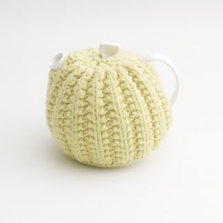 Bone China Teapot designed by Linda Bloomfield, with zesty lemon knitted cosy by Ruth Cross