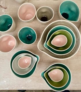 Dimpled cups and pouring bowls. I’ve been making this range of dimpled ware since 2005. They are made from porcelain thrown on the wheel with a satin matt glaze on the outside and glossy coloured glazes on the inside. 

I started with just pale pink and pale blue and later added other colours including grey, turquoise and lime green. I’m thinking of reducing the range of colours and including a celadon blue. Which is your favourite glaze colour?